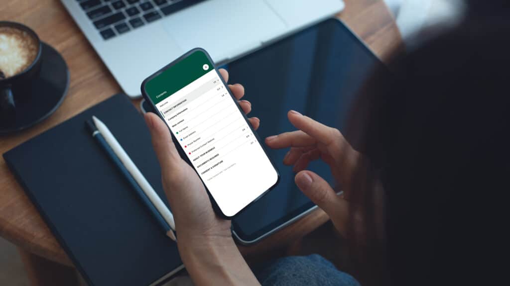 Close up of a client looking at a Gatheroo request on a mobile phone